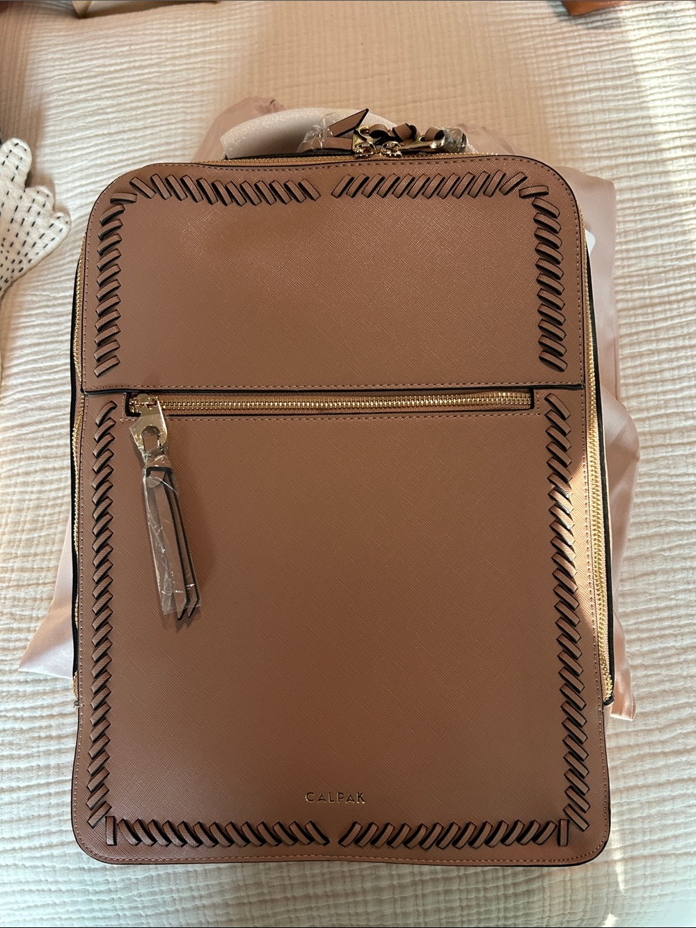 Calpak in caramel with Blush Pink Logo Dust Cover